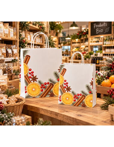 De twee maten kerstdraagtassen in een biowinkel