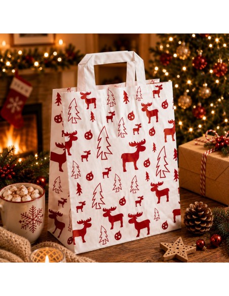 Witte papieren kerstcadeauzak met elandmotief in kerstsfeer